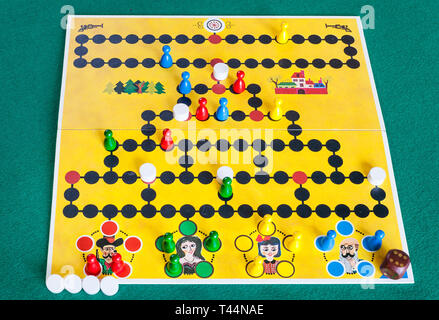 MOSCOW, RUSSIA - APRIL 2, 2019: gameplay of Malefiz ( Barricade) strategy board game on green baize table. The game was designed by Werner Schoppner a Stock Photo