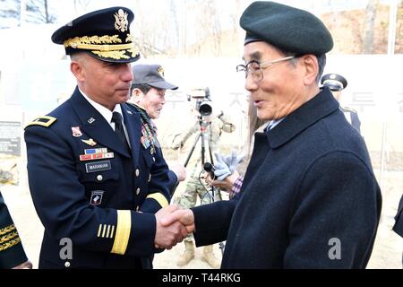 CHIPYONG-NI, Republic of Korea – Brig. Gen. Stephen J. Maranian, deputy commanding general-maneuver, 2nd Infantry Division/ROK-U.S. Combined Division and Boston, Massachusetts native, embraces Korean War veteran, Mr. Park, Dung Ha, during the 68th anniversary of the Battle of Chipyong-ni at the Chipyong-ni Combat Monument and Memorial Hall, Feb. 21. Park, former riflemen, 3rd Platoon, 2nd Company, French Foreign Legion, fought in the battle in February 1951. Stock Photo