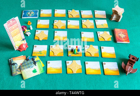 MOSCOW, RUSSIA - APRIL 3, 2019: starting position of Forbidden Desert cooperative board game (russian edition). The game was developed by Matt Leacock Stock Photo