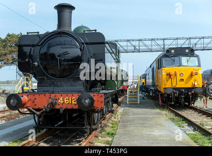 Long Rock, Penzance, UK. 13th April 2019. GWR 4612 Steam locomotive with Diesel engine in background Credit: Bob Sharples/Alamy Live News Stock Photo