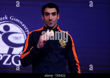 Szczecin, West Pomeranian, Poland. April 13, 2019 - Szczecin, West Pomeranian, Poland - Vahagn Davtyan from Armenia seen with bronze medal of the rings final during Apparatus Finals of 8th European Championships in Artistic Gymnastics Credit: Mateusz Slodkowski/SOPA Images/ZUMA Wire/Alamy Live News Stock Photo