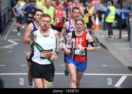 Brighton, Sussex, UK. 14th Apr, 2019. The early leaders in this years Brighton Marathon which is celebrating its 10th anniversary Credit: Simon Dack/Alamy Live News Stock Photo