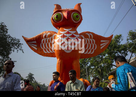 Dhaka, Bangladesh. 14th Apr, 2019. Bangladesh, Dhaka 14 April 2019 - Bangladeshi people come to attend a rally to celebrate the Bengali New Year or 'Pohela Boishakh 1426' in Dhaka. People attend with colorful clothes in 'Pohela Boishakh', which falls every year on April 14 in Bangladesh. Credit: KM Asad/ZUMA Wire/Alamy Live News Stock Photo