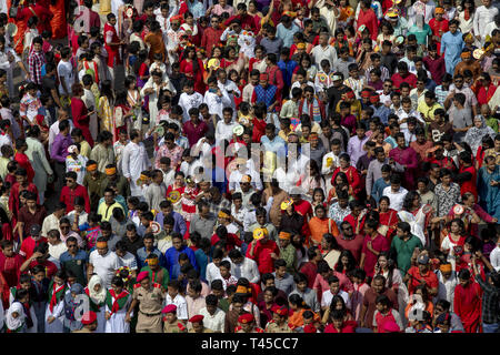 Dhaka, Bangladesh. 14th Apr, 2019. Bangladesh, Dhaka 14 April 2019 - Bangladeshi people attend a rally to celebrate the Bengali New Year or 'Pohela Boishakh 1426' in Dhaka. People attend with colorful clothes in 'Pohela Boishakh', which falls every year on April 14 in Bangladesh. Credit: KM Asad/ZUMA Wire/Alamy Live News Stock Photo