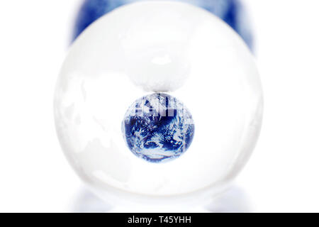 glass globe ball on a white background, Abstract photo with glass and reflection. Stock Photo