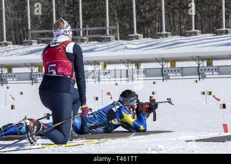 Athletes compete in the 2019 Chief, National Guard Bureau Biathlon Championship Patrol Race, Camp Ethan Allen Training Site, Jericho, Vt., Feb. 28, 2019. The CNGB Championships consist of the sprint, pursuit, patrol, and relay race. Stock Photo