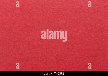 Red paper background with delicate pattern for background usage. Stock Photo