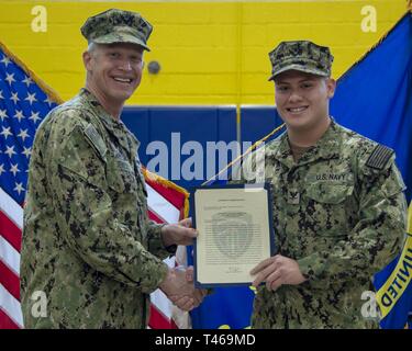 Capt. Ryan T. Tewell, commanding officer Naval Support Activity Souda ...