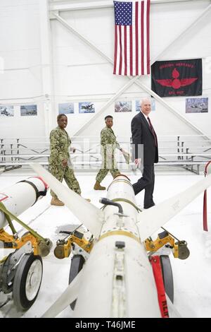 PENSACOLA, Fla. (March 13, 2019) Aviation Ordnanceman 2nd Class Sydney Smith, left, an instructor at Naval Air Technical Training Center (NATTC), explains how naval aviation ordnance technicians are taught to Charles Drummond, deputy assistant secretary of defense for education and training in the Office of the Assistant Secretary of Defense for Readiness.  Drummond toured NATTC during a visit to Pensacola that also included Naval Education and Training Command, where he discussed topics such as credentialing; Ready, Relevant Learning; and information technology transformation initiatives. Stock Photo