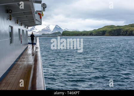 View of Prion Island on a cloudy day from outside deck of cruise ship, South Georgia, Atlantic Ocean Stock Photo