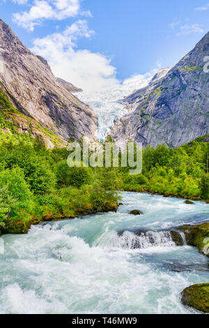 Melting Briksdal glacier in Norway - is one of the most accessible and best known arms of the Jostedalsbreen glacier. Detail of the Briksdalsbreen in  Stock Photo