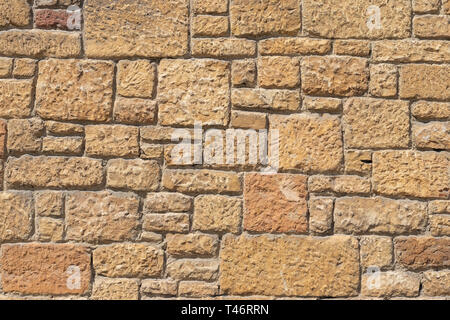 The masonry structure of the wall of the ancient church in Spain. San Julian de los Prados. World Cultural Heritage Site Stock Photo