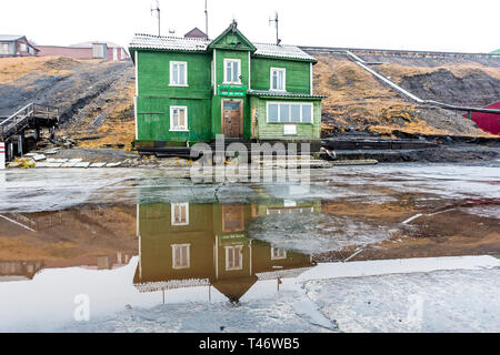 Wooden House at Barentsburg Harbour, Russian territory, Svalbard, Norway Stock Photo