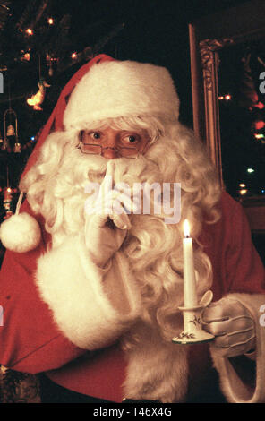 Santa Claus gesturing silence, USA Stock Photo