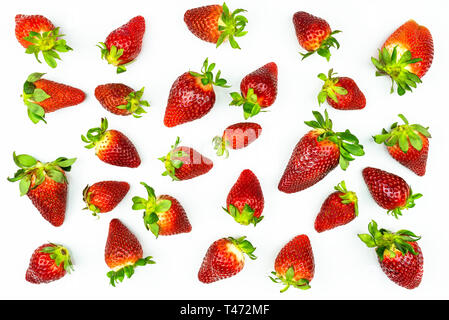 Pattern made from fresh strawberries, top view, flat lay pattern, isolated on a white background. Stock Photo