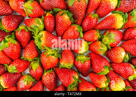 Pattern made from fresh strawberries, top view, flat lay pattern. Stock Photo