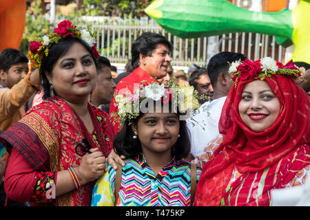 Dhaka, Bangladesh. 14th Apr, 2019. Mangal Shobhajatra, a colourful and festive procession celebrating Pahela Baishakh, the Bangala New Year, sets off  Stock Photo