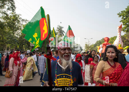 Dhaka, Bangladesh. 14th Apr, 2019. Mangal Shobhajatra, a colourful and festive procession celebrating Pahela Baishakh, the Bangala New Year, sets off  Stock Photo