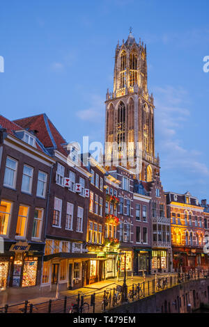 Utrecht city center with the Dom Tower of the St. Martins Cathedral, the Vismarkt (Fish Market) and the Oudegracht (Old Canal) during sunset. Stock Photo