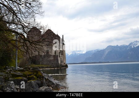 Medieval Chillon Castle, Montreux, Switzerland on a cloudy day in Spring (April) on beautiful Lake Geneva Stock Photo