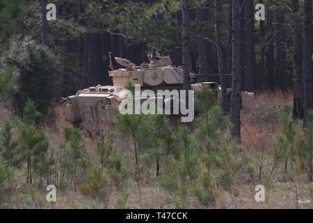 An M2A2 Bradley Fighting Vehicle assigned to 3rd Battalion, 15th Infantry Regiment, engages notional enemy combatants during Marne Focus at Fort Stewart, Ga., Mar. 15.  Marne Focus is a division-level field exercise that precedes an upcoming rotation at the National Training Center at Fort Irwin, Ca. Stock Photo