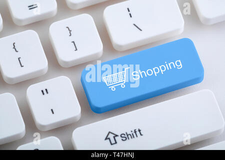 Computer keyboard with shopping button Stock Photo