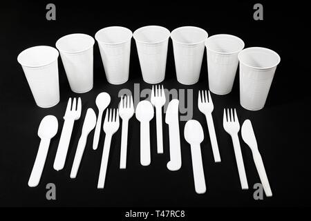 White plastic cutlery, plastic knife, plastic forks, plastic spoon, plastic cup, plastic garbage, Germany Stock Photo