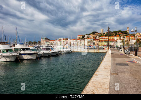 City of Cannes in France, view from Le Vieux Port waterfront to Le Suquet - the Old Town on French Riviera Stock Photo