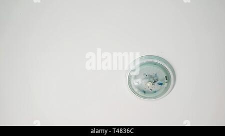 Round lamp on white ceiling Stock Photo