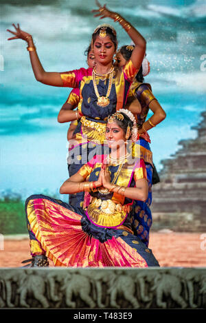 Vertical view of beautiful Bharatanatyam dancers performing during Pongal festivities in India. Stock Photo
