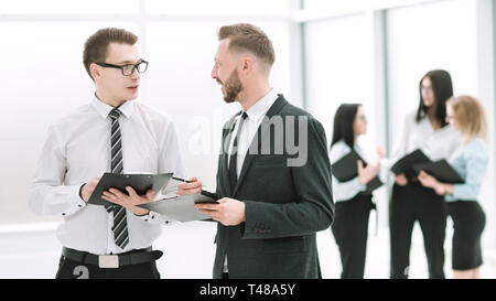 close up. business colleagues discussing work issues . business concept Stock Photo