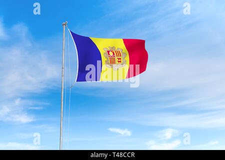 Andorra flag blowing in the wind over nice blue sky background Stock Photo