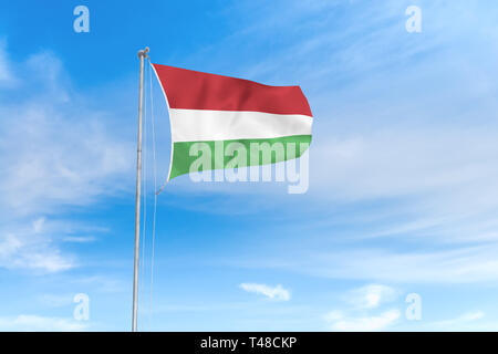 Hungary flag blowing in the wind over nice blue sky background Stock Photo