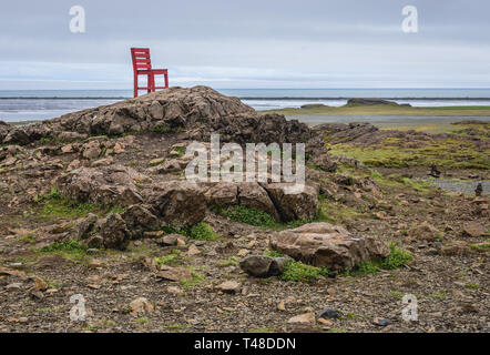 Red chair statue in southeast Iceland, between Hofn and Egilsstadir ...