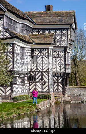 Little Moreton Hall, moated black and white half timbered Tudor manor house near Congleton in Cheshire, owned by the national trust Stock Photo