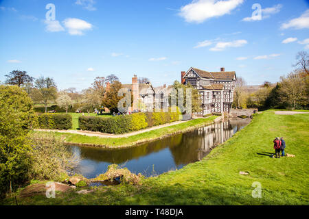 Little Moreton Hall, moated black and white half timbered Tudor manor house near Congleton in Cheshire, owned by the national trust Stock Photo