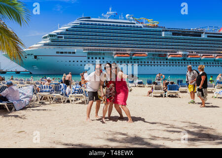 Grand Turk, Turk Islands Caribbean-31st March 2014: The cruise ship 'Carnival Breeze' anchored on the beach of Grand Turk. The British-American Carniv Stock Photo