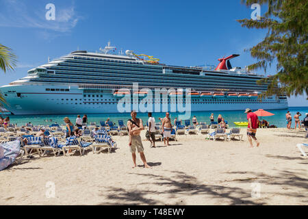 Grand Turk, Turk Islands Caribbean-31st March 2014: The cruise ship 'Carnival Breeze' anchored on the beach of Grand Turk. The British-American Carniv Stock Photo