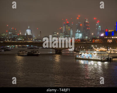London at night: A view of the Thames including Waterloo Bridge, St. Paul's Cathedral and the London skyline Stock Photo