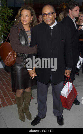LOS ANGELES, CA. September 28, 2003: QUINCY JONES & daughter JOLIE at the opening of designer Stella McCartney's first Los Angeles store. Stock Photo