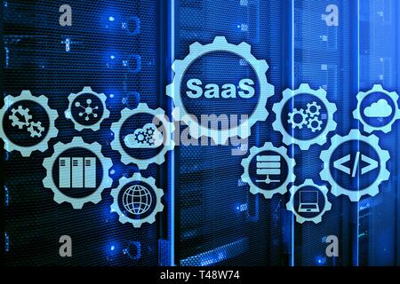 Software as a Service SaaS. Software concept. Modern technology model on a virtual screen server room background. Software On Demand. Stock Photo