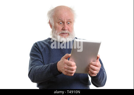 Funny shocked senior man using tablet computer isolated on white Stock Photo