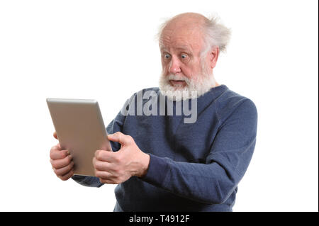 Funny shocked senior man using tablet computer isolated on white Stock Photo