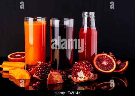 Bottles with different colorful drinks. Healthy lifestyle Stock Photo