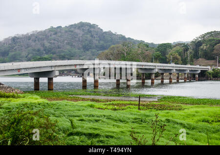 The Gamboa Bridge, the meeting place of the Chagres River and the Panama Canal. The effect of the dry season is observed on the shores and riverbed Stock Photo