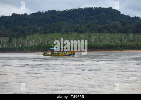 Beni River, Bolivia - MAY 12, 2018: transport of bananas in Beni River in Beni Region, Bolivia. The rivers are the main roads in the Amazon jungle. Stock Photo