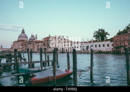 Venice, Italy - June 30, 2018: Panoramic view of Venice grand canal view with historical buildings and boats, away of Basilica Salute. Landscape of su Stock Photo