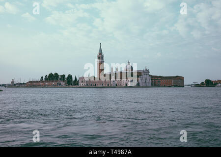 Panoramic view of Laguna Veneta of Venice city and away San Giorgio Maggiore Island. Landscape of summer morning day and dramatic blue sky Stock Photo