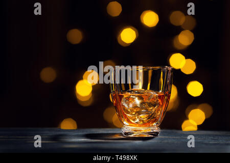 whiskey with ice cubes in glass Stock Photo