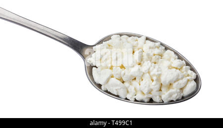 Spoon of cottage cheese isolated on white background, top view Stock Photo